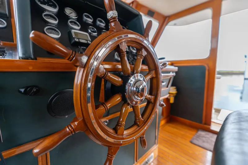 Slide: The Image of Wooden helm of 1965 De Vries Lentsch 64 Motoryacht with classic gauges. - 112