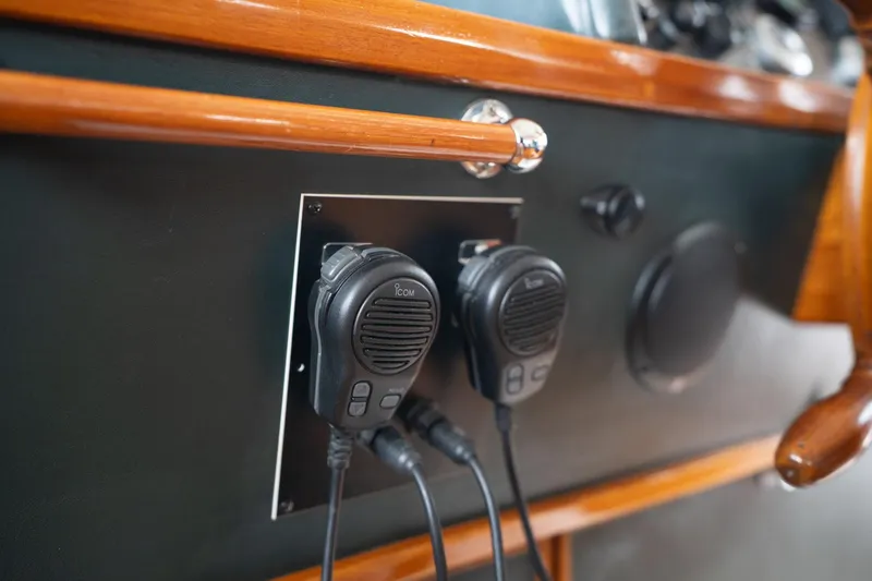 Slide: The Image of ICOM radios on De Vries Lentsch 64 Motoryacht, 1965 model, wooden dashboard detail. - 115