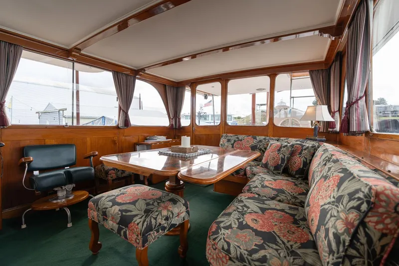 Slide: The Image of Elegant interior of 1965 De Vries Lentsch 64 Motoryacht with floral upholstery and wooden accents. - 17