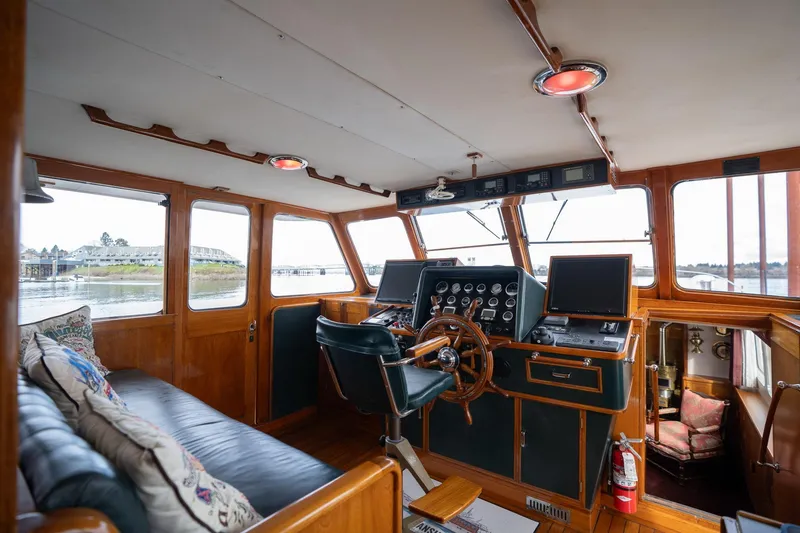 Slide: The Image of Interior of 1965 De Vries Lentsch 64 Motoryacht with classic wooden helm and seating. - 20