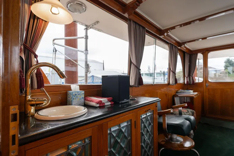 Slide: The Image of Interior of 1965 De Vries Lentsch 64 Motoryacht with wooden cabinetry and elegant decor. - 22