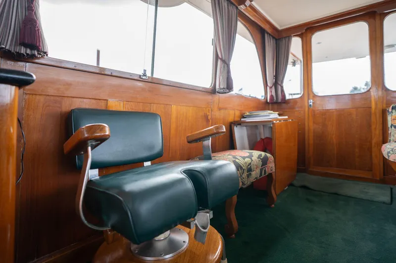 Slide: The Image of Interior of 1965 De Vries Lentsch 64 Motoryacht with vintage seating and wooden paneling. - 24
