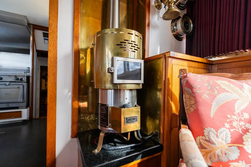 Slide: The Image of Vintage brass heater in 1965 De Vries Lentsch 64 Motoryacht interior, with floral cushion nearby. - 28