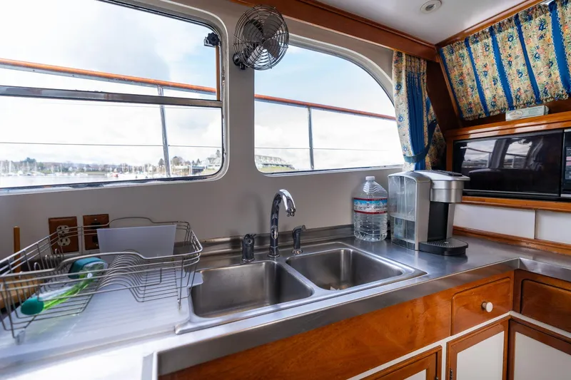Slide: The Image of Interior of 1965 De Vries Lentsch 64 Motoryacht kitchen with sink and appliances. - 37