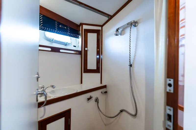 Slide: The Image of Bathroom interior of 1965 De Vries Lentsch 64 Motoryacht with shower and sink. - 44