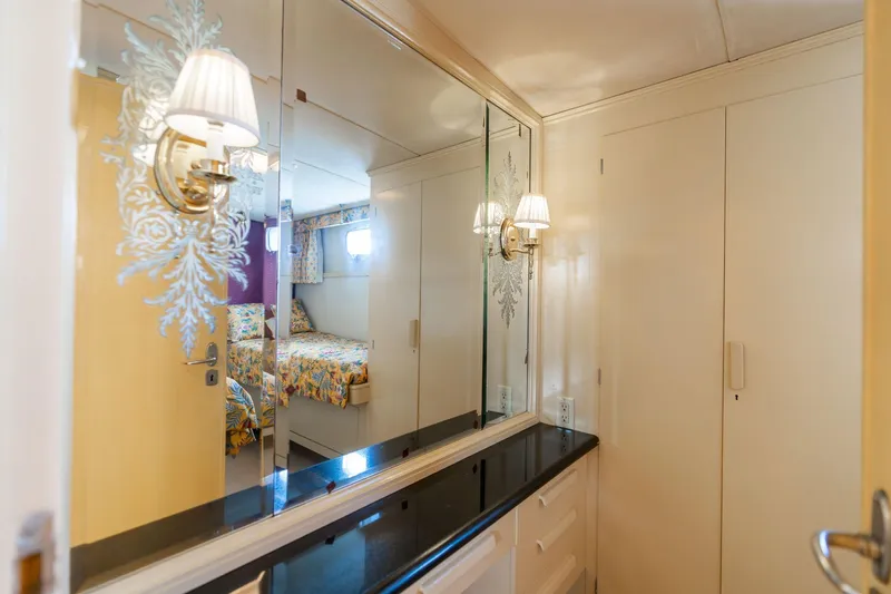 Slide: The Image of Elegant interior of 1965 De Vries Lentsch 64 Motoryacht with mirrored wall and decorative lighting. - 48