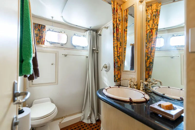 Slide: The Image of Luxurious bathroom in a 1965 De Vries Lentsch 64 Motoryacht with vintage decor. - 50