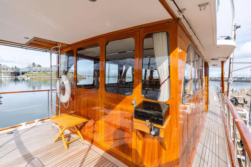 Slide: The Image of Classic 1965 De Vries Lentsch 64 Motoryacht with polished wood deck and cabin. - 71