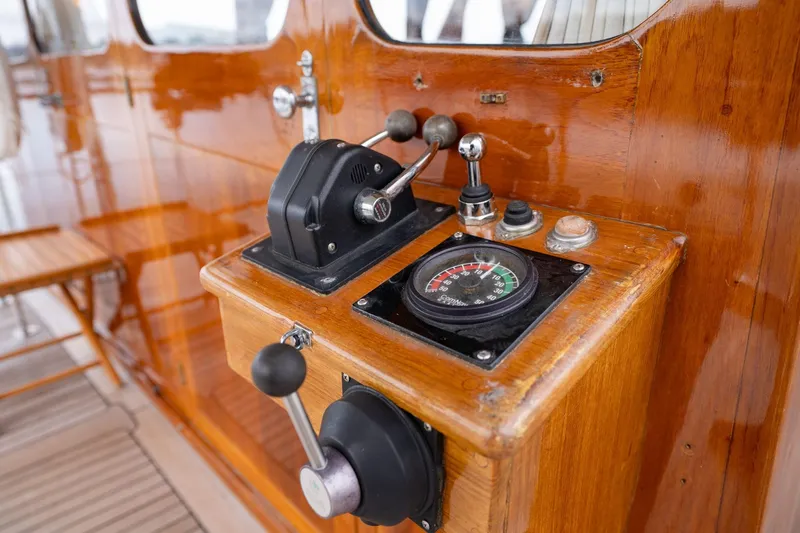 Slide: The Image of Control panel of a 1965 De Vries Lentsch 64 Motoryacht with wooden finish. - 72