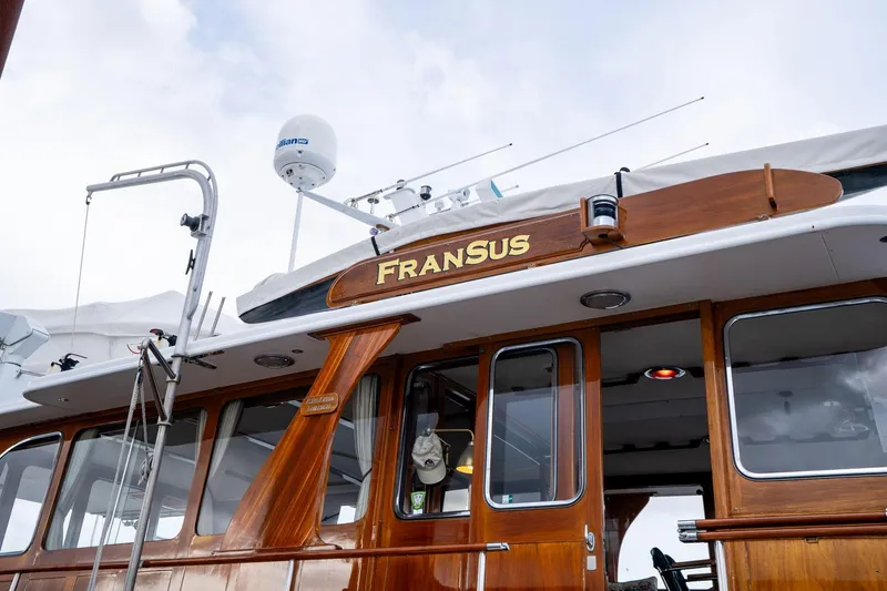 Slide: The Image of Classic 1965 De Vries Lentsch 64 Motoryacht with wooden details and "FRANSUS" nameplate. - 82