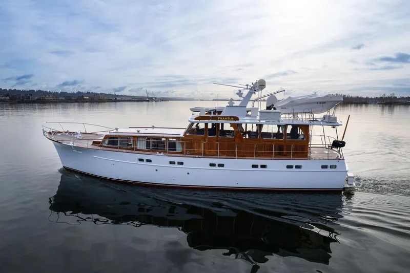 Slide: The Image of Classic 1965 De Vries Lentsch 64 Motoryacht cruising on calm waters. - 85