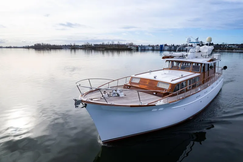 Slide: The Image of Classic 1965 De Vries Lentsch 64 Motoryacht cruising on calm waters. - 86