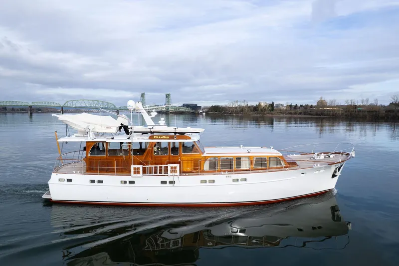 Slide: The Image of Classic 1965 De Vries Lentsch 64 Motoryacht cruising on calm waters. - 88