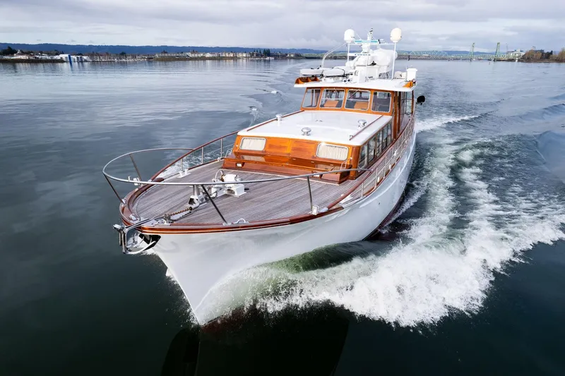 Slide: The Image of Classic 1965 De Vries Lentsch 64 Motoryacht cruising on calm waters. - 95