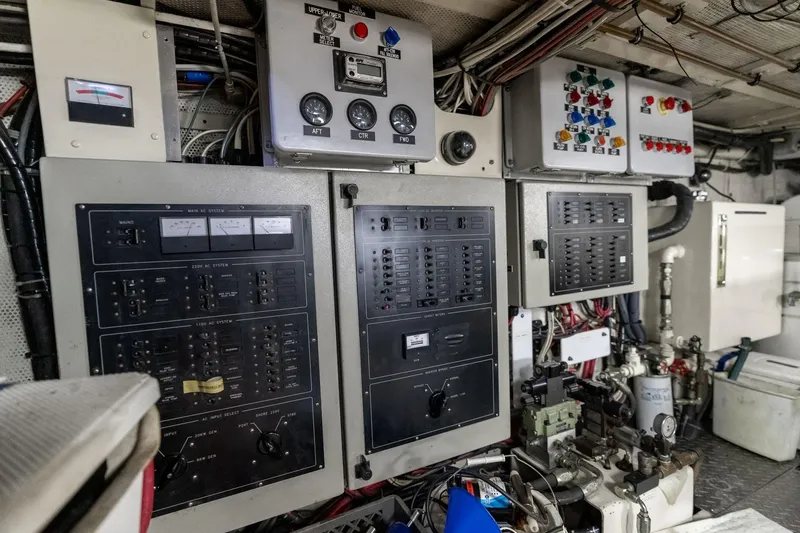 Slide: The Image of Electrical control panels in the engine room of a 1965 De Vries Lentsch 64 Motoryacht. - 99
