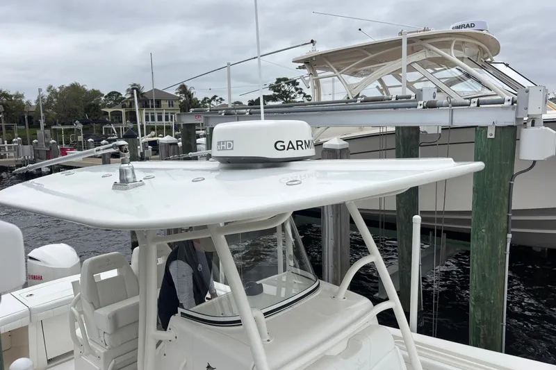 Slide: The Image of 2017 Regulator 28 boat with Garmin radar at marina dock. - 13
