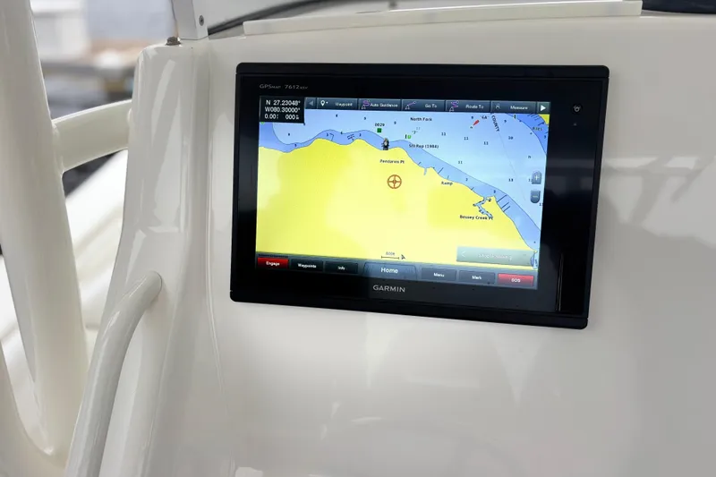 Slide: The Image of Garmin GPS display on 2017 Regulator 28 boat, showing nautical map and navigation details. - 31