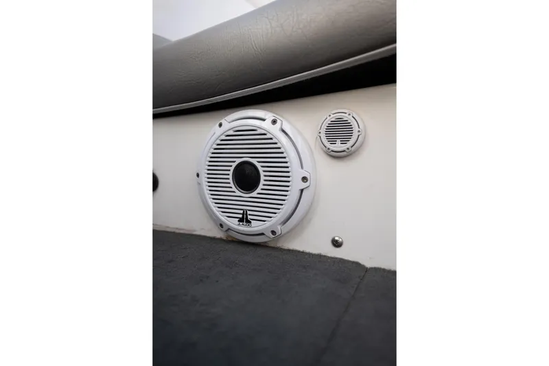 Slide: The Image of White speakers installed in a 2005 MasterCraft X10 boat interior. - 39