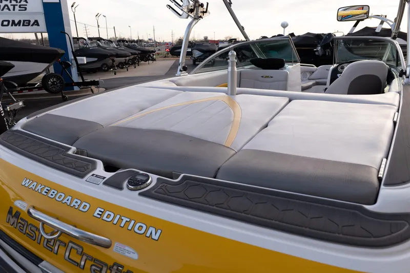 Slide: The Image of 2005 MasterCraft X10 Wakeboard Edition boat with sleek seating and stylish design. - 48