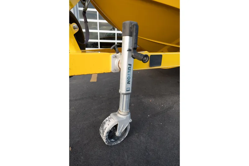 Slide: The Image of Trailer jack wheel on a 2005 MasterCraft X10 boat trailer. - 50