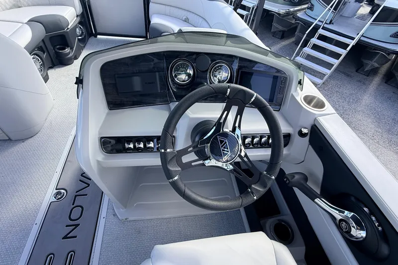 Slide: The Image of Cockpit of 2026 Avalon 2385 LSZ Versatile Rear Bench, Tri Toon High Performance boat. - 23