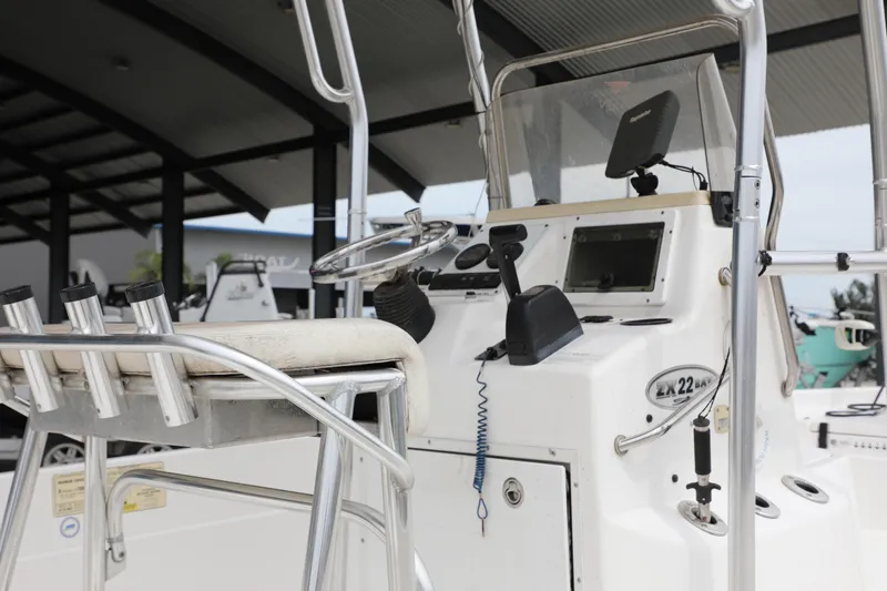 Slide: The Image of 2006 Skeeter ZX22 Bay T boat console with steering wheel and controls. - 11