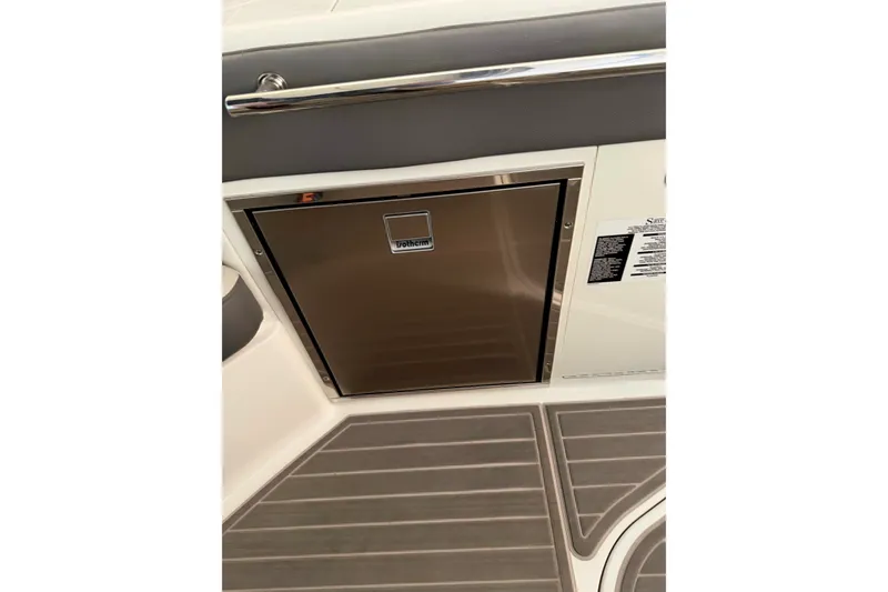 Slide: The Image of Stainless steel fridge on 2023 Sea Ray Sundancer 320 Coupe boat deck. - 12