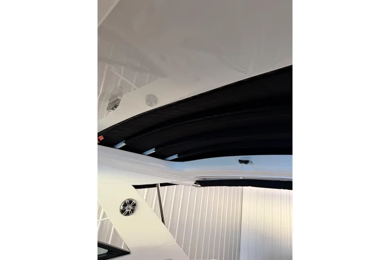 Slide: The Image of 2023 Sea Ray Sundancer 320 Coupe interior roof detail with speaker. - 16