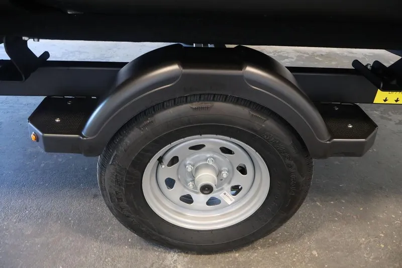Slide: The Image of Trailer wheel of 2026 Sea-Doo Switch Cruise Limited 18, featuring sturdy black fender. - 34