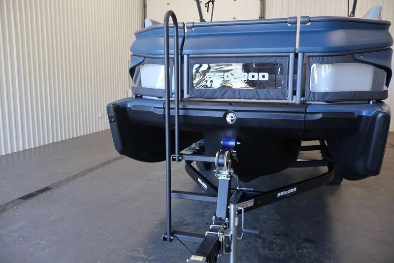Slide: The Image of 2026 Sea-Doo Switch Cruise Limited 18 on trailer in storage facility. - 38