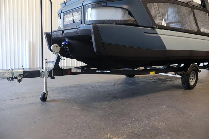 Slide: The Image of 2026 Sea-Doo Switch Cruise Limited 18 on trailer in indoor setting. - 37
