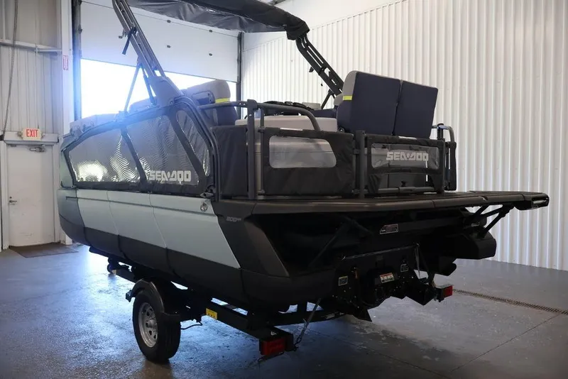 Slide: The Image of 2026 Sea-Doo Switch Cruise Limited 18 on trailer in indoor storage facility. - 7