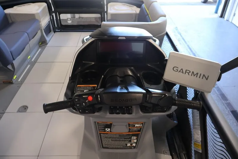 Slide: The Image of 2026 Sea-Doo Switch Cruise Limited 18 dashboard with Garmin navigation system. - 15