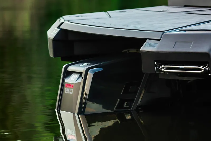 Slide: The Image of Manufacturer Provided Image: Manitou Cruise 2025 boat with Rotax 150 engine in water. - 6