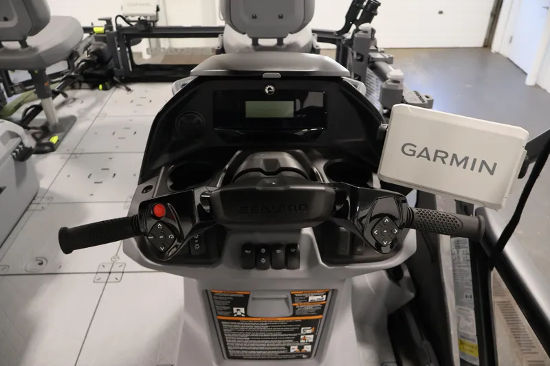Slide: The Image of 2026 Sea-Doo Switch Fish 18 dashboard with Garmin navigation system and control panel. - 31