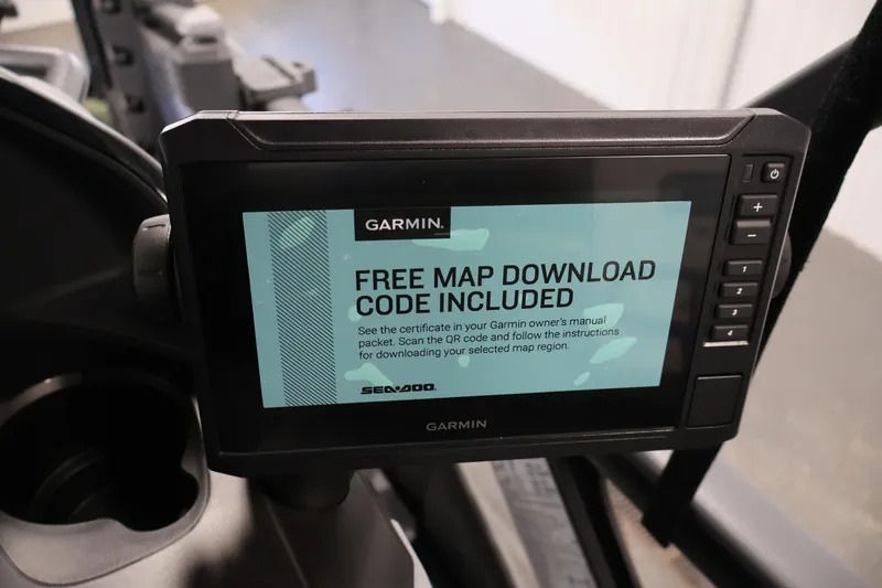 Slide: The Image of Garmin display on 2026 Sea-Doo Switch Fish 18 showing free map download offer. - 36