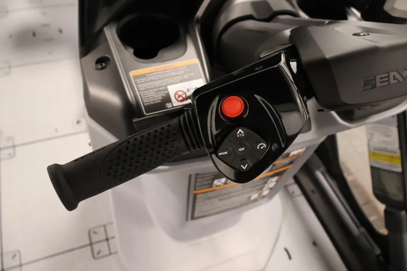 Slide: The Image of Close-up of 2026 Sea-Doo Switch Fish 18 handlebar controls with buttons and grip. - 32