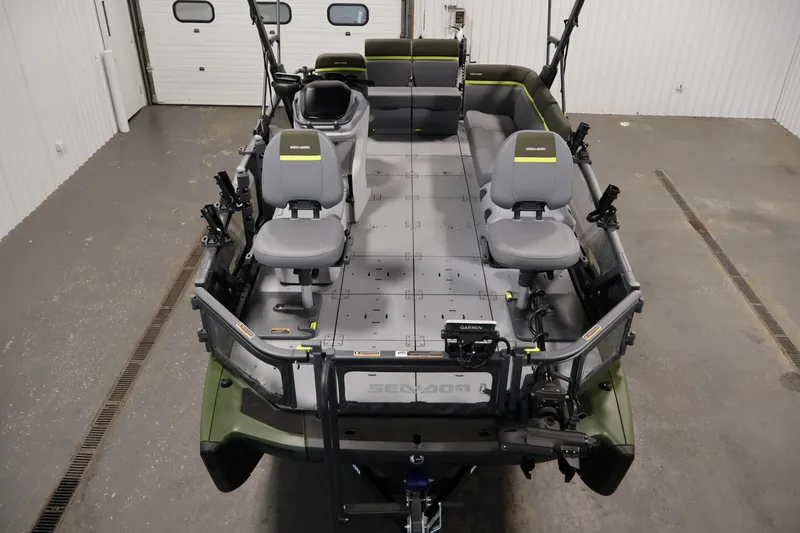 Slide: The Image of 2026 Sea-Doo Switch Fish 18 pontoon boat interior with seating and fishing equipment. - 16