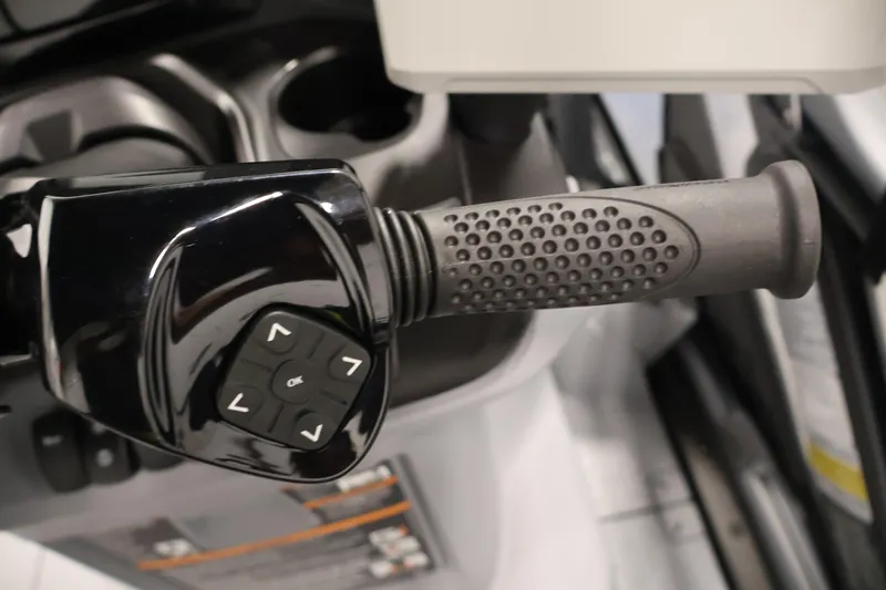 Slide: The Image of Close-up of 2026 Sea-Doo Switch Fish 18 handlebar with control buttons. - 33