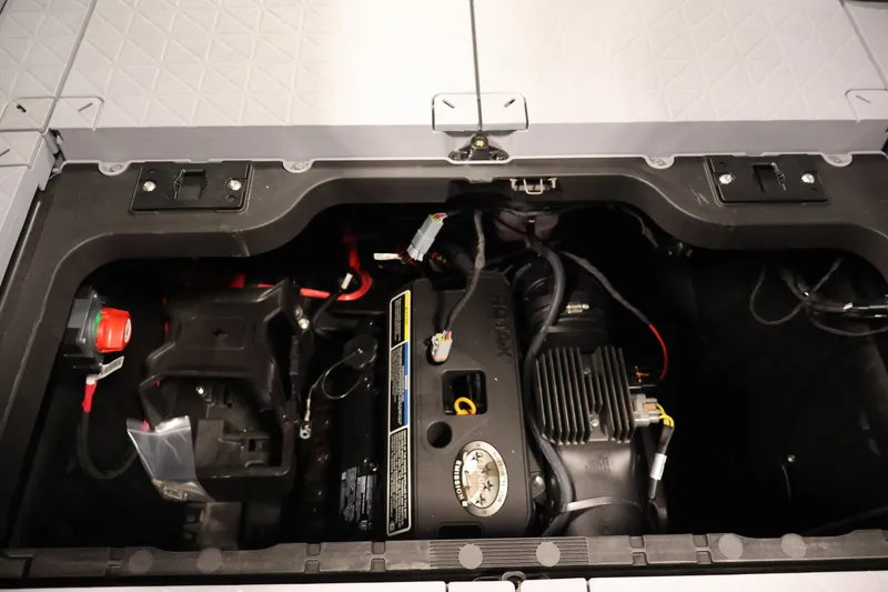 Slide: The Image of Engine compartment of 2026 Sea-Doo Switch Fish 18, showcasing internal components and wiring. - 56