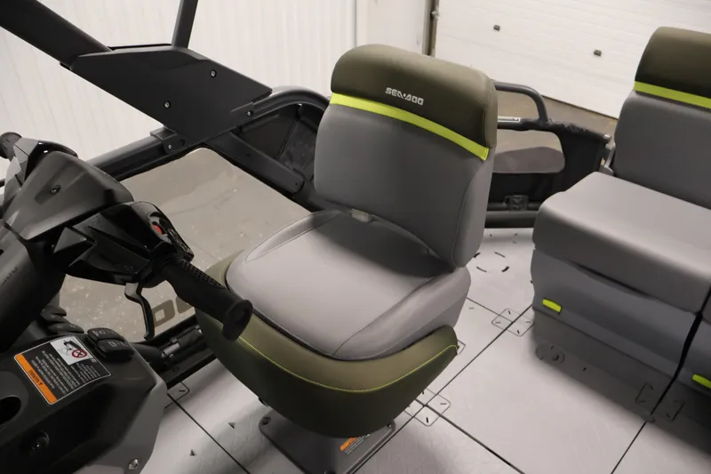 Slide: The Image of 2026 Sea-Doo Switch Fish 18 interior with modern seating and controls. - 39