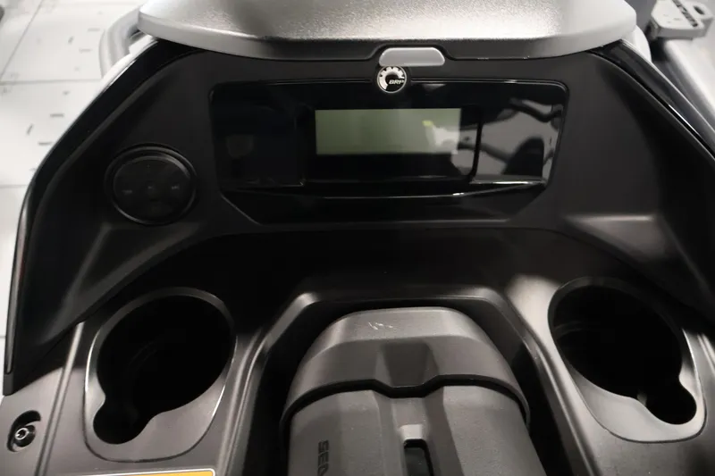 Slide: The Image of Dashboard of 2026 Sea-Doo Switch Fish 18 with control panel and cup holders. - 34