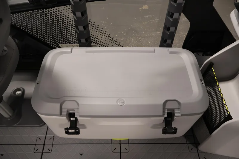 Slide: The Image of 2026 Sea-Doo Switch Fish 18 interior with storage compartment and secure latch. - 24