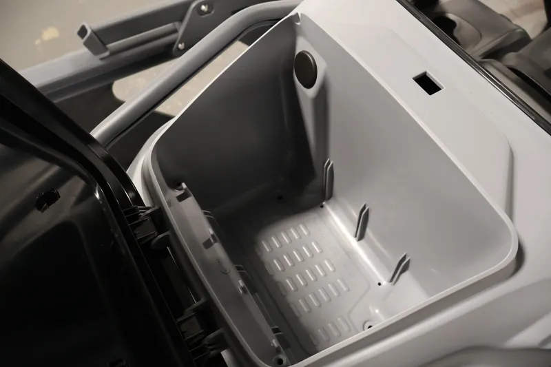 Slide: The Image of Storage compartment of 2026 Sea-Doo Switch Fish 18, showcasing spacious interior design. - 29