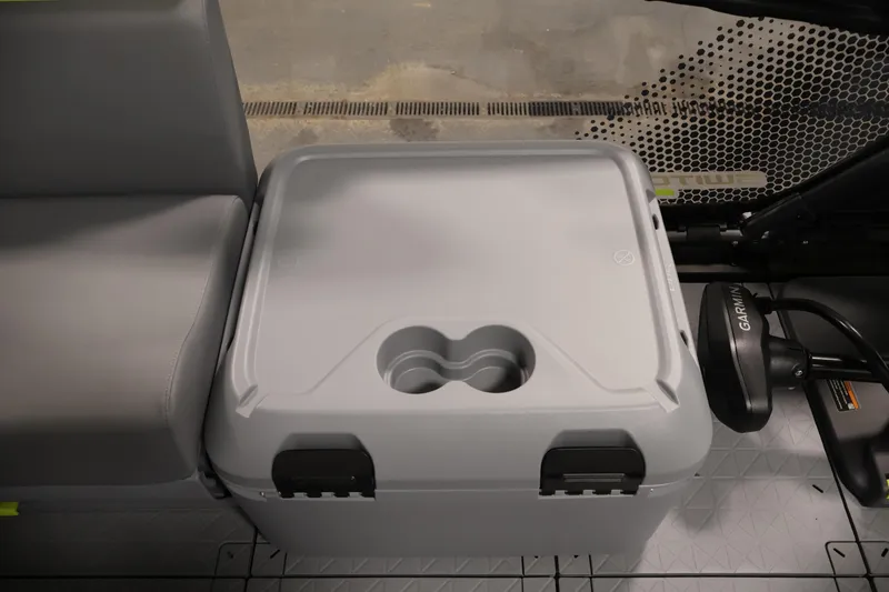 Slide: The Image of 2026 Sea-Doo Switch Fish 18 interior with storage compartment and Garmin device. - 26