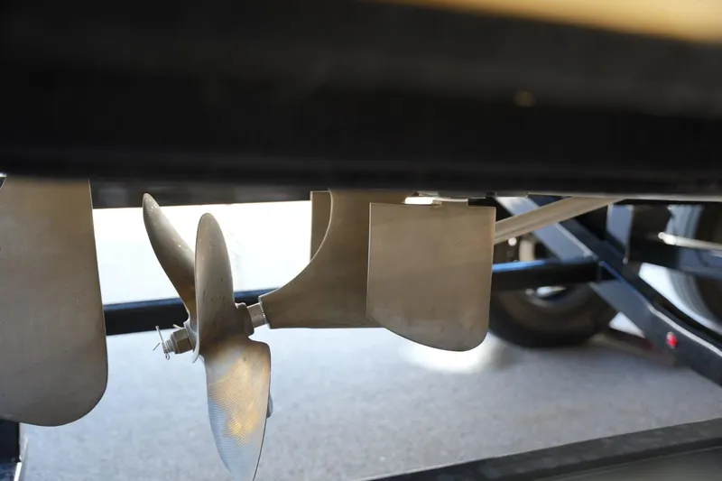 Slide: The Image of 2019 MasterCraft XT22 boat propeller and rudder detail. - 29