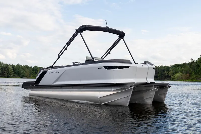 Slide: The Image of Manufacturer Provided Image: 2025 Manitou Cruise pontoon boat on calm water. - 4