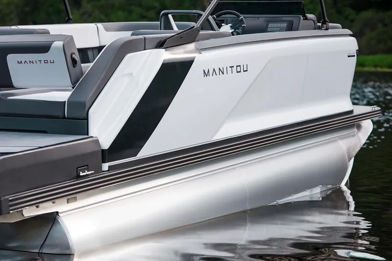 Slide: The Image of Manufacturer Provided Image: 2025 Manitou Cruise boat on calm water. - 6