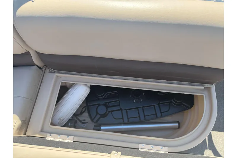 Slide: The Image of Storage compartment in a 2019 Sun Tracker Bass Buggy 16 DLX boat. - 15