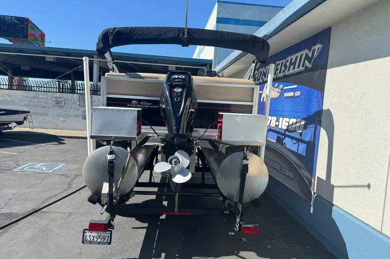 Slide: The Image of 2019 Sun Tracker Bass Buggy 16 DLX pontoon boat with outboard motor. - 6